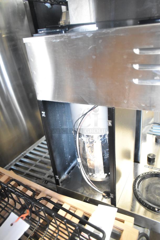 2017 Bunn VPR 12 Cup Pourover Coffee Brewer with 2 Warmers. Black model, 120 Volts. Inner component view.