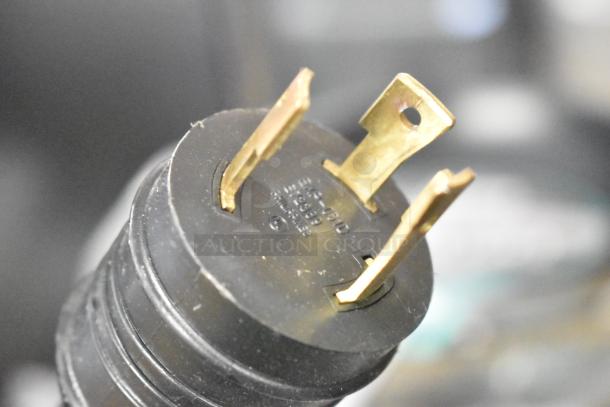 Close-up of a power plug for a 2021 AJ Antunes BKT-2V Commercial Countertop Vertical Toaster, 200-240V, 1 Phase.