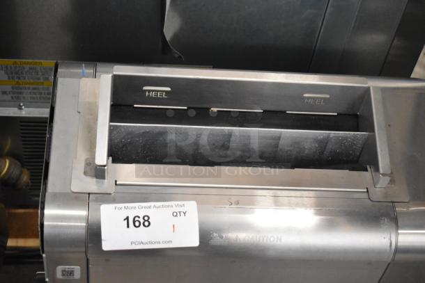 New 2021 AJ Antunes BKT-2V vertical toaster, stainless steel, 200-240V, minor scratches. Tag indicates "Heel" slots.