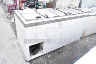 Master-Bilt DC-10D commercial chest freezer on casters, stainless steel lids, 208-230V, 1 phase, used condition.