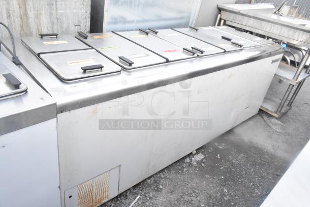 Master-Bilt DC-10D commercial chest freezer, on casters, stainless steel, 208-230V, 1 phase, used condition with visible wear.