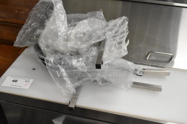 20 new items including 407FRYPANNS Choice 10" aluminum non-stick fry pan, 267020002 Choice Dominion stainless steel spoon.