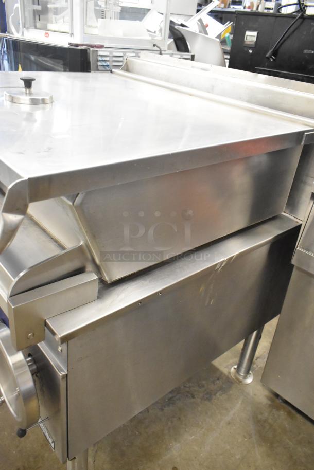 Cleveland BPAN-1001 commercial floor-style braising pan, stainless steel, in used condition. Visible control dial and sturdy legs.