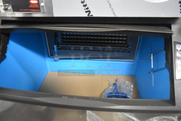 BRAND NEW 2022 Manitowoc UDF0310A-261Z undercounter dishwasher, 208-230V, 1 phase, with visible interior components.