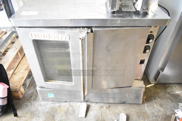 Blodgett commercial full-size convection oven with solid and view-through door, thermostatic controls, used condition.