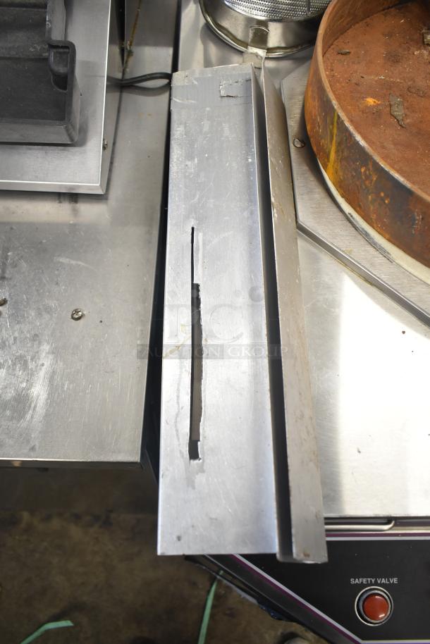 Toastmaster TCT-1627 R natural gas tandoor oven, stainless steel finish, 85,500 BTU, visible safety valve, minor wear.