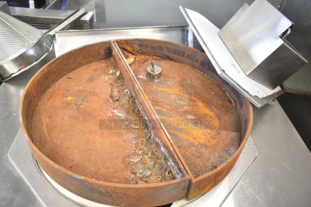 Toastmaster TCT-1627 R commercial tandoor oven, ceramic, natural gas, 85,500 BTU, visible rust, used condition.