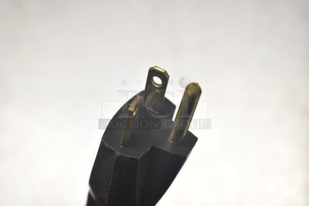 Close-up image of the plug for a 2021 Prince Castle EHB24-2 product holding bin, showing 208-240V compatibility.