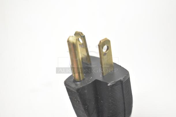 Close-up image of a three-prong electrical plug for a 2021 Prince Castle EHB24 Commercial Countertop Holding Bin.