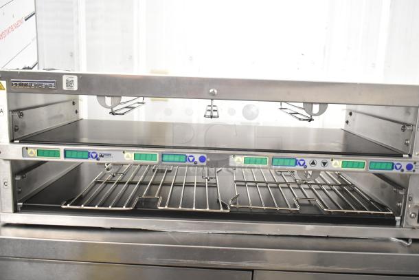 Brand new Prince Castle EHB24 countertop holding bin, 208-240V, 1 phase, with minor scratches and dents.