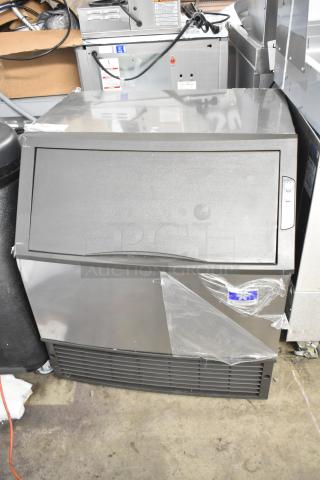 Brand new scratch and dent Manitowoc UDF0310A-261Z undercounter dishwasher, 208-230V, 1 phase, visible plastic wrap.