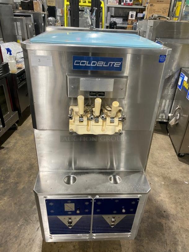 ColdElite UF8202 stainless steel soft serve machine with dual/twin twist dispensers, on casters; clean, professional condition.
