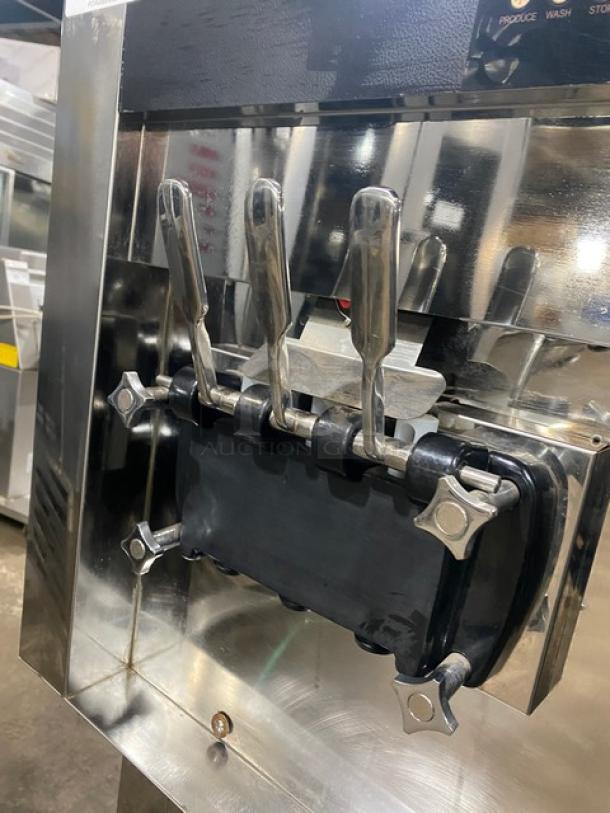Elvaria 515 twin/twist soft serve machine, stainless steel, 2 hoppers, 3 dispensers, electric 220-240V, on casters, excellent condition.