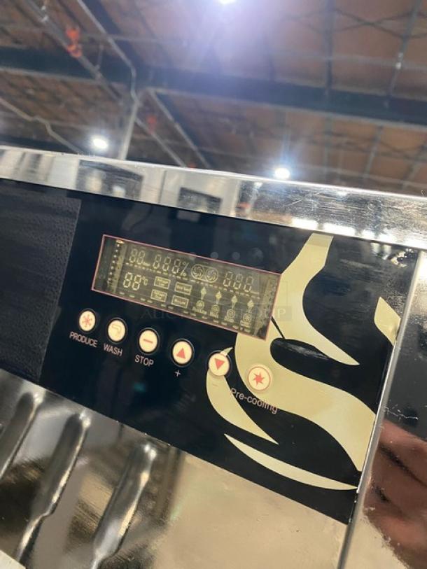 Elvaria Model 515 twin/twist soft serve machine, stainless steel, digital display, 2 hoppers, 3 dispensers, on casters.