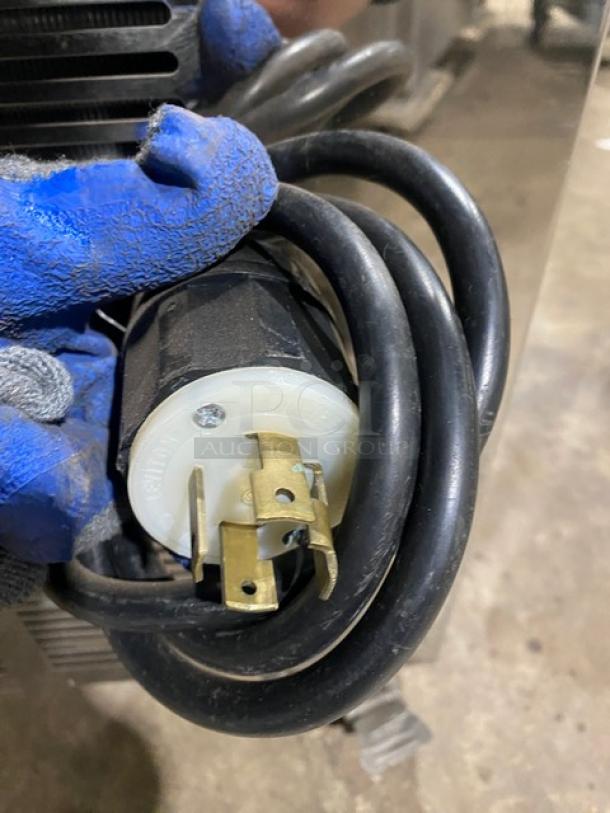 Electric plug for Elvaria Model 515 soft serve machine, showing a 220-240V connector, in clean condition.