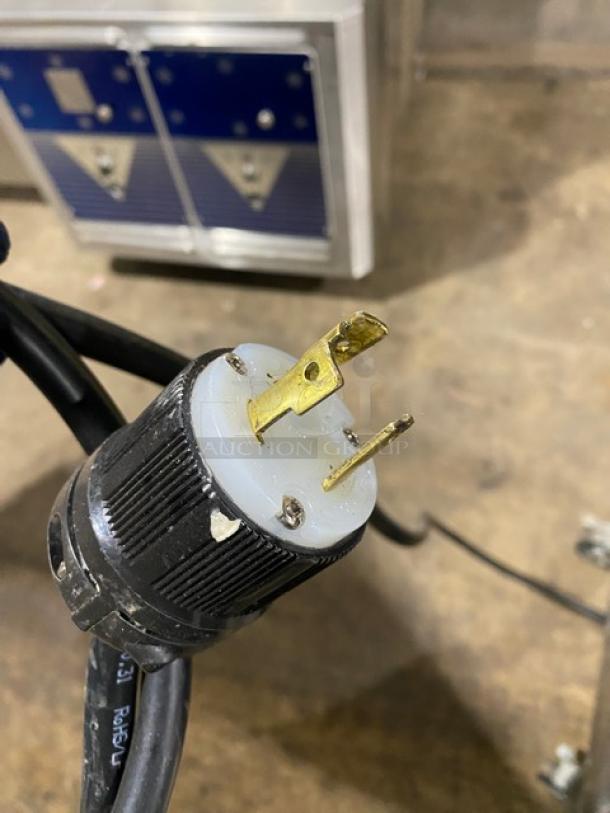 Well Spring Stainless Steel Soft Serve Machine Model SSI143S, features 2 hoppers, 3 dispensers, digital controls, on casters.