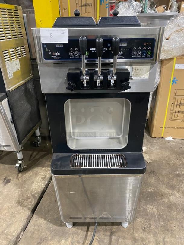 Well Spring SSI143S soft serve machine, stainless steel, 2 hoppers, 3 dispensers, digital controls, drip tray, on casters.