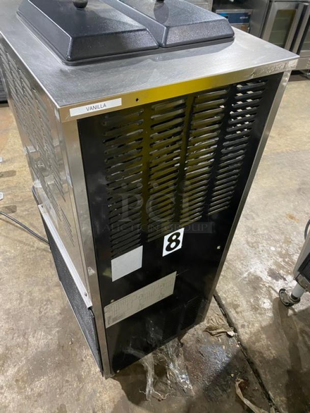 Well Spring SSI143S commercial ice cream machine, stainless steel, 2 hoppers, 3 dispensers, digital controls, on casters.