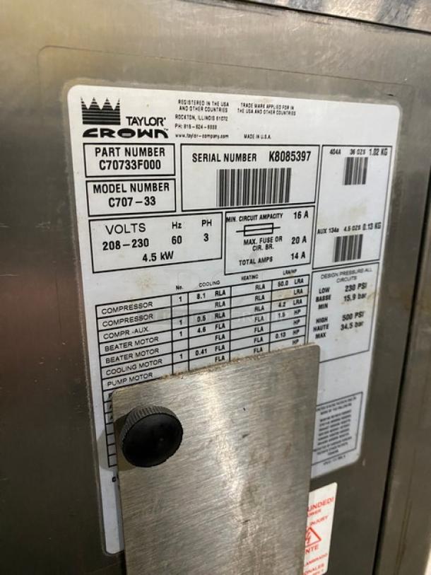 Taylor C707-33 single flavor soft serve machine label, 208-230V, 3 phase, serial K8085397, stainless steel, electric powered.