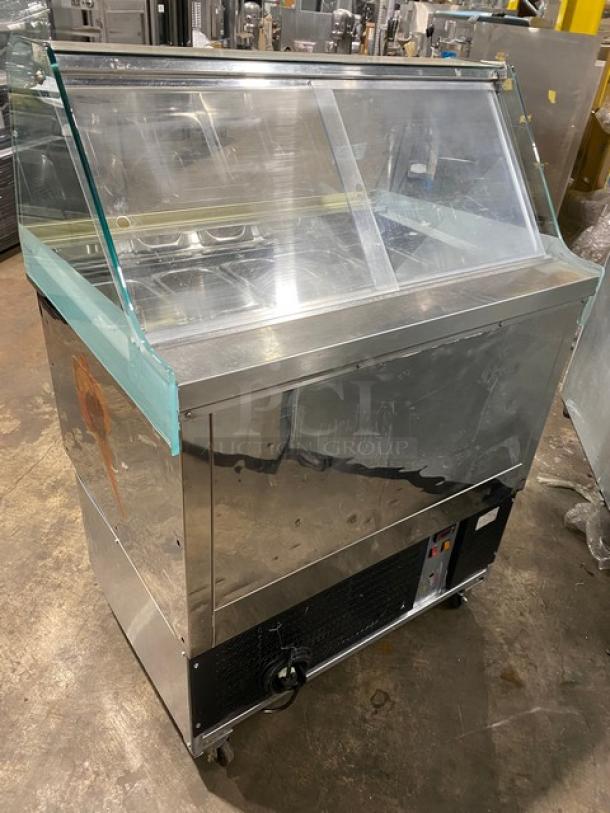 Gencarelli's Style stainless steel gelato case, 10-pan capacity, rear sliding door access, on casters, excellent condition.
