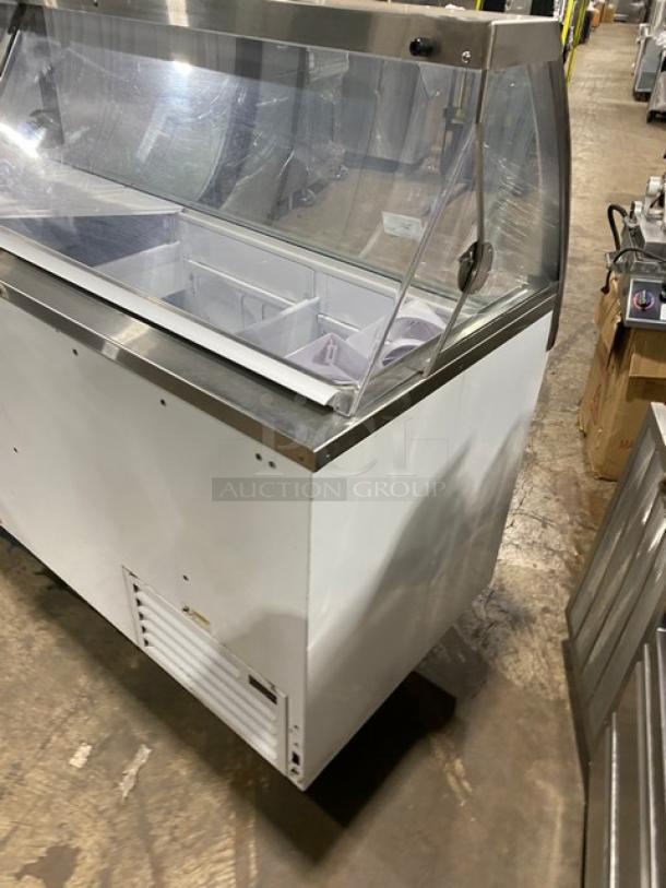 Commercial ice cream dipping cabinet, Global CKDC87V-BR, white, dual lift-open doors, tub holders, 115V, clean condition.