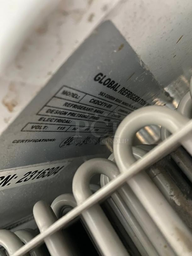 Global CKDC87V-BR ice cream cabinet, model label shown. Features dual lift-open doors, tub holders, 115V, SN: 2316304.