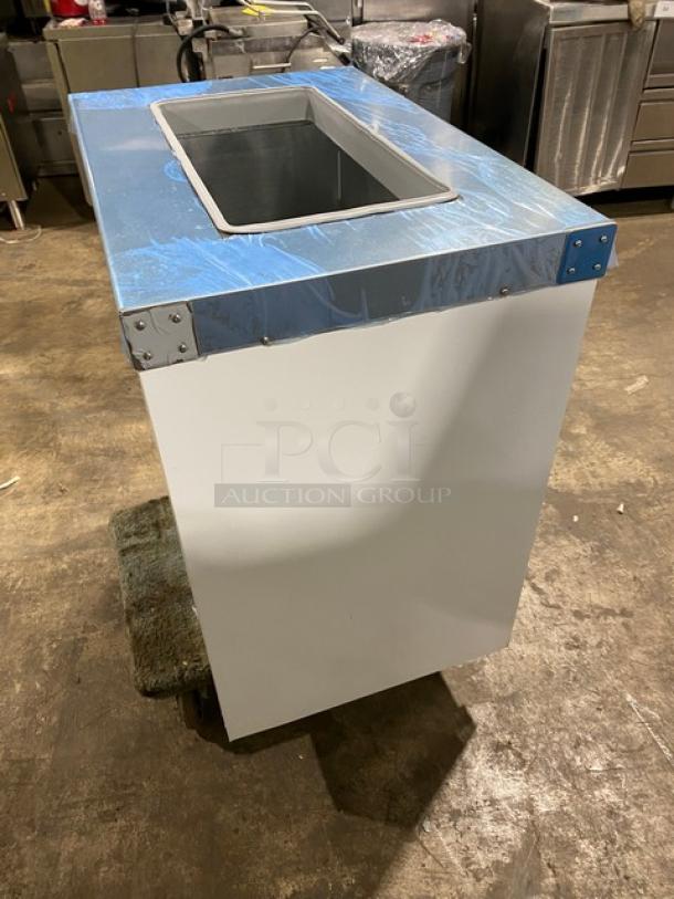 Master-Bilt 32" ice cream dipping cabinet, Model DC-2S, new condition, white with flip lid, SN: 0006098-32166-C.