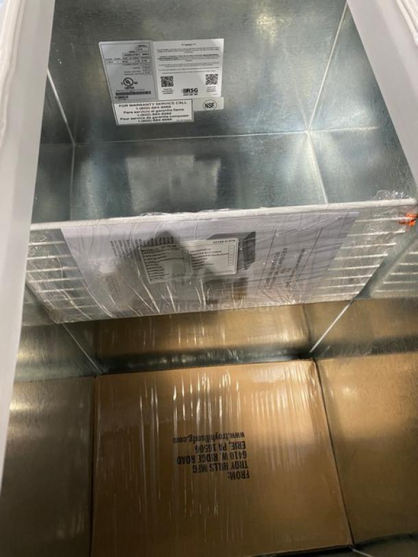 Master-Bilt DC-2S commercial ice cream dipping cabinet, new condition, 32" white, flip-style lid, 115V 1 phase, shown with packaging.