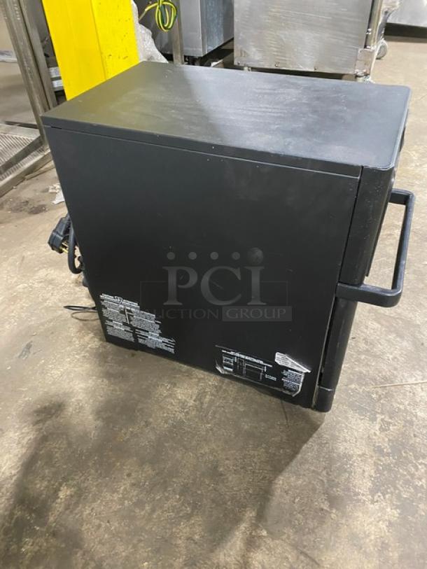 MerryChef Eikon E2S black electric rapid cook oven, 2022 model, 208/240V, 1 phase, serial number 2204213090436, in good condition.