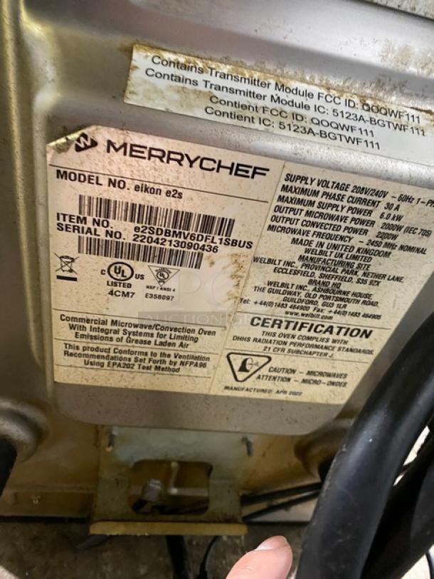 MerryChef Eikon E2S commercial rapid cook oven, electric, black, model 2022, 208/240V, serial 2204213090436, label shown.