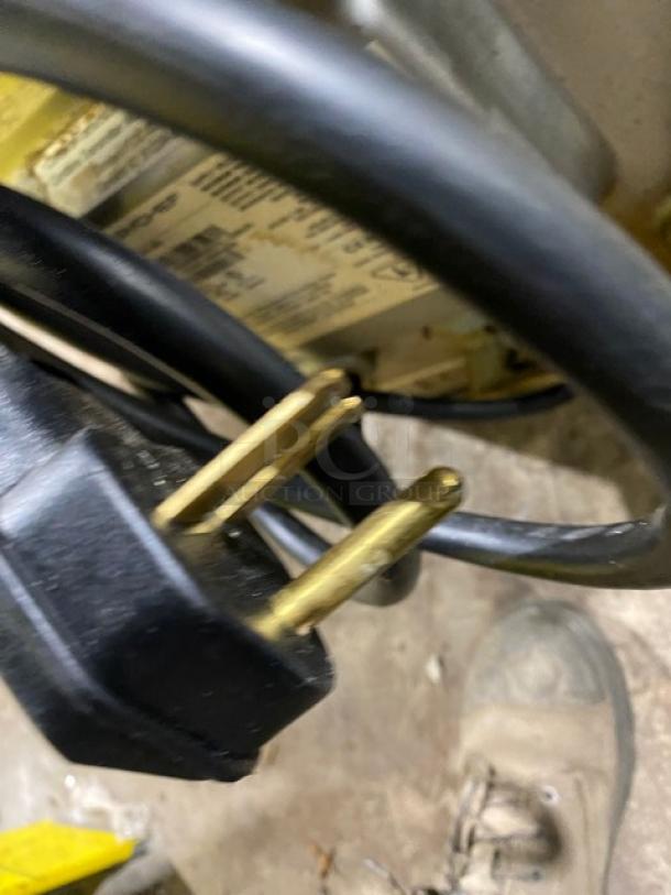 Close-up of MerryChef Eikon E2S electric plug and power cord, highlighting the 208/240V 1 Phase connection.