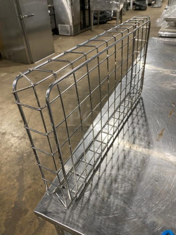 Chrome-plated, full-size bagel/pastry wired rack, commercial use, excellent condition, durable metal grid design, no visible markings.