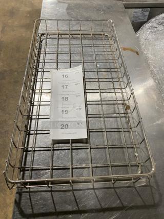 Commercial chrome plated full-size wired rack for bagels/pastries. Durable construction, used condition. Auction tag visible.