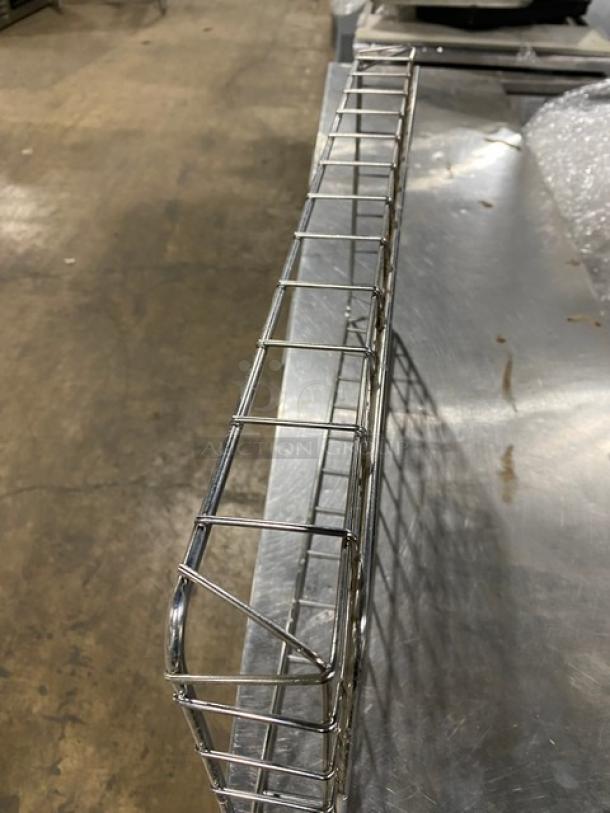 Commercial chrome-plated full-size bagel/pastry wire rack, excellent condition, durable construction, ideal for display or storage.