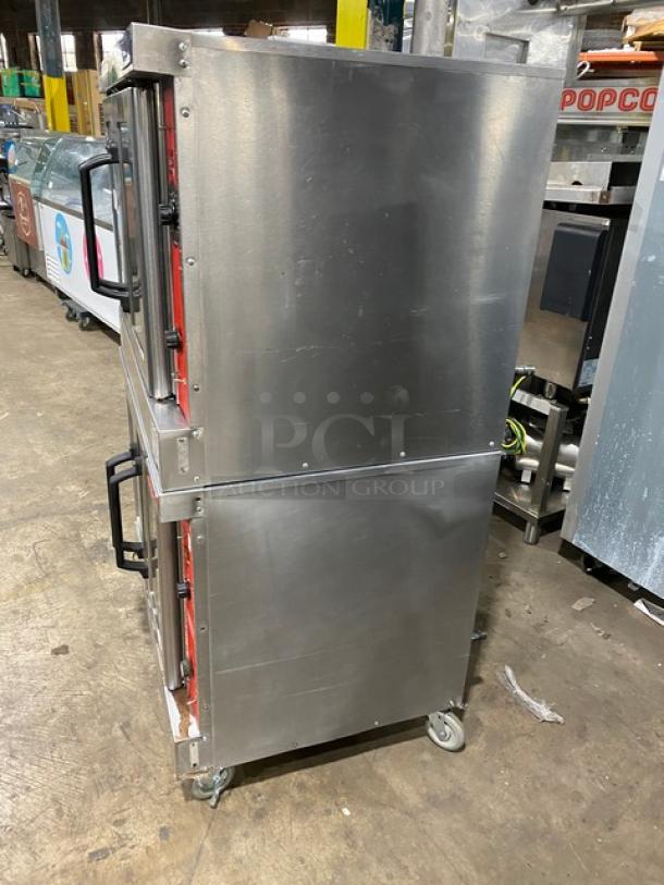Vulcan stainless steel gas-powered double stacked convection oven, Model VC4GD11D150K, on casters. Includes wired oven rack.