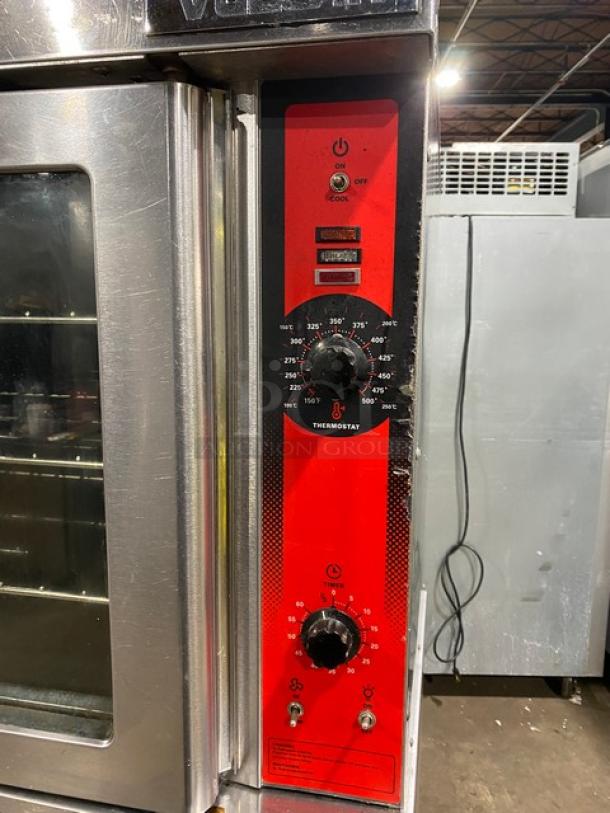 Vulcan VC4GD11D150K commercial stainless steel gas convection oven, double stacked, on casters, with thermostat controls.