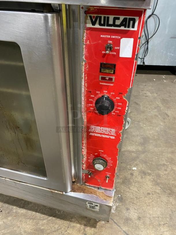 Vulcan stainless steel double-stacked convection oven, model VC4GD-11D150K, on casters, featuring a visible control panel with thermostat.