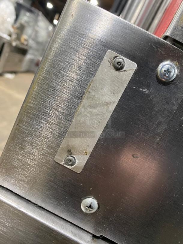 Vulcan stainless steel convection oven, model VC4GD11D150K, gas-powered, double-stacked, on casters, with oven rack.