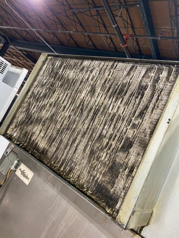 Kold-Draft GB561AC stainless steel ice maker, electric-powered, air-cooled, on legs. Visible wear on coils. 115V, 1 phase.