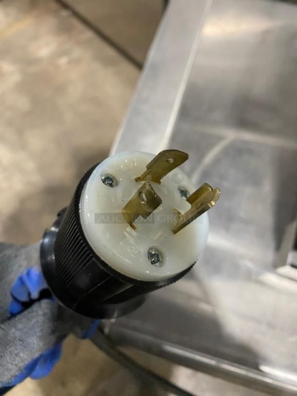 Close-up of a plug for a TurboChef ECO Series high-speed rapid cook oven.