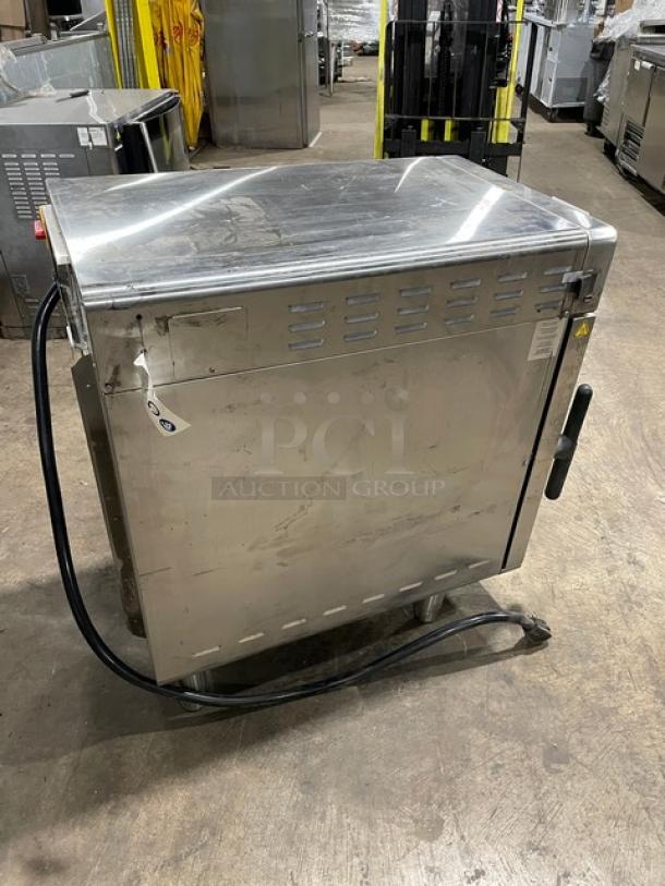 Alto-Shaam VMC-H3 2021 Vector-H Series stainless steel countertop oven with 3 cooking zones and touch controls, on legs.