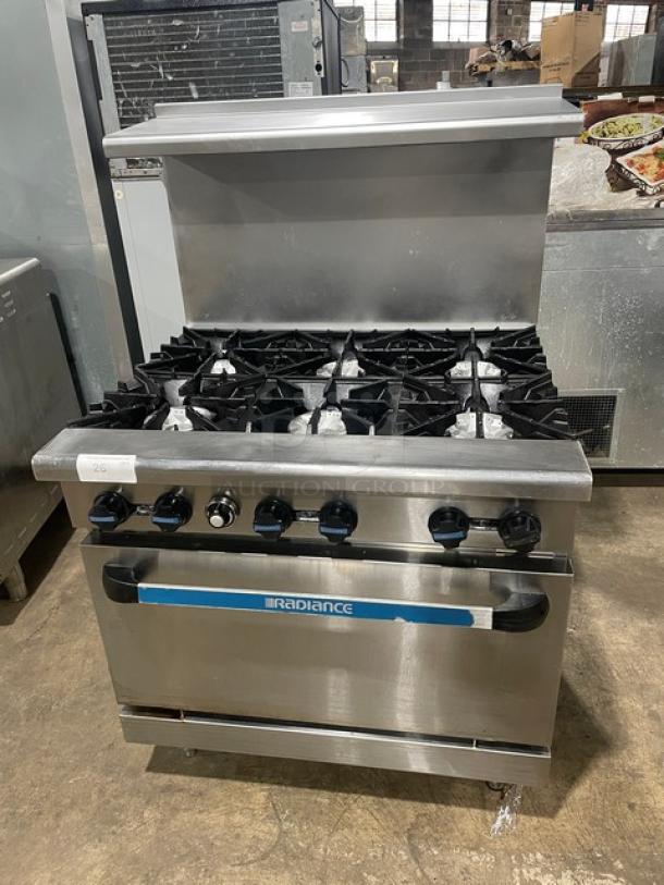 Radiance by Turbo Air commercial stainless steel 6-burner gas range/oven combo with backsplash, overhead salamander shelf, and wired oven rack.