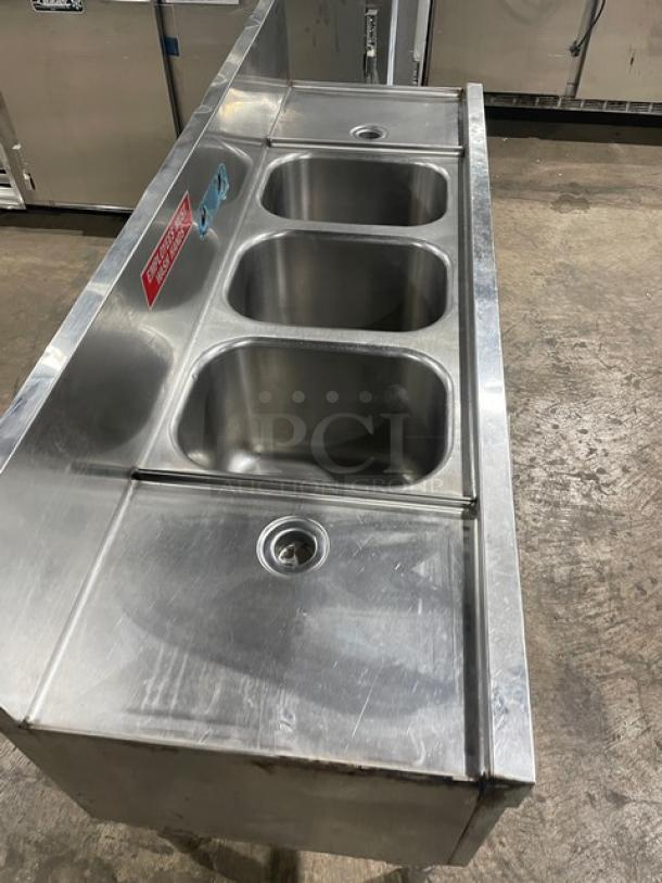 Eagle Group Spec-Bar 2000 Series stainless steel 3-compartment underbar sink with side drain boards and backsplash, model B53LR19.