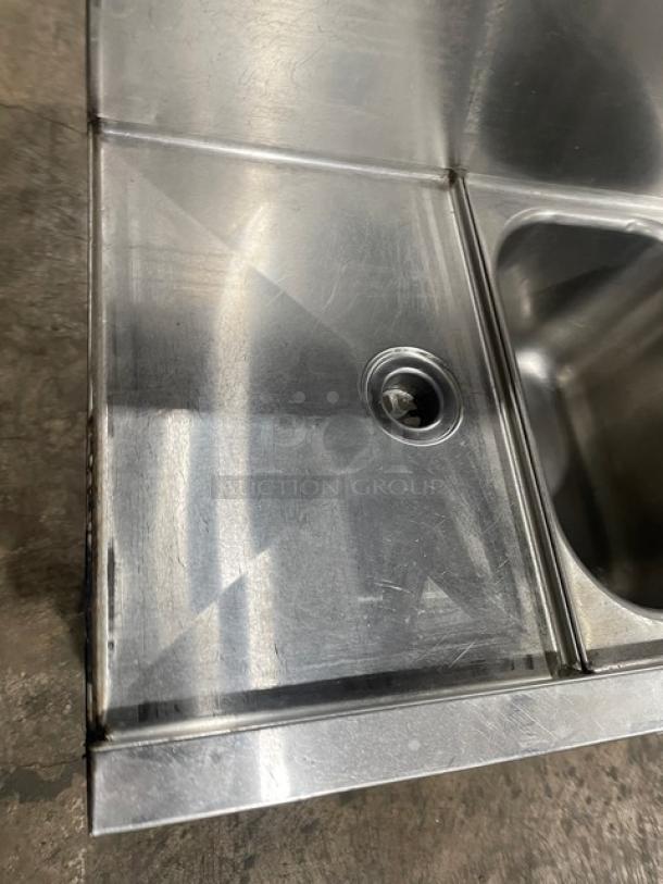 Eagle Group Spec-Bar 2000 Series 60" stainless steel 3-compartment underbar sink with left and right drain boards, model B53LR19.