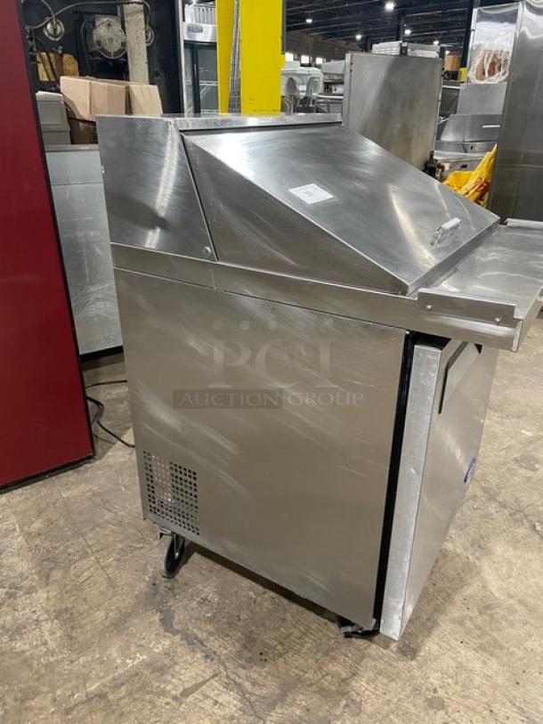 Atosa 2021 stainless steel single door refrigerated prep table, model MSF8305GR, on casters, with poly coated rack.