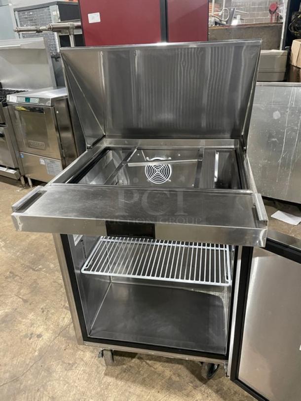 Atosa 2021 stainless steel single door refrigerated prep table, Model MSF8305GR, includes poly-coated wire rack, on casters.