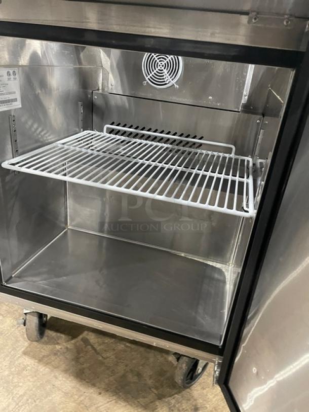 Atosa MSF8305GR refrigerated prep table, stainless steel, 2021, single door, poly-coated rack, on casters.