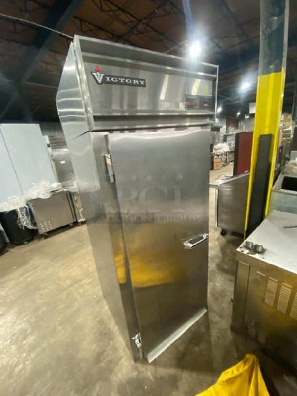 Victory stainless steel roll-in pass-thru refrigerator, model RIS1DS7PT, serial M0391561, featuring a solid door.