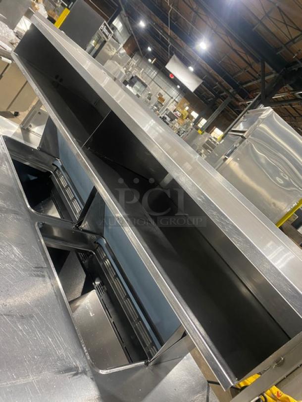 Delfield UCD4464N-12-DD5 stainless steel 4-drawer refrigerated prep table with enclosed overhead shelf in good condition.