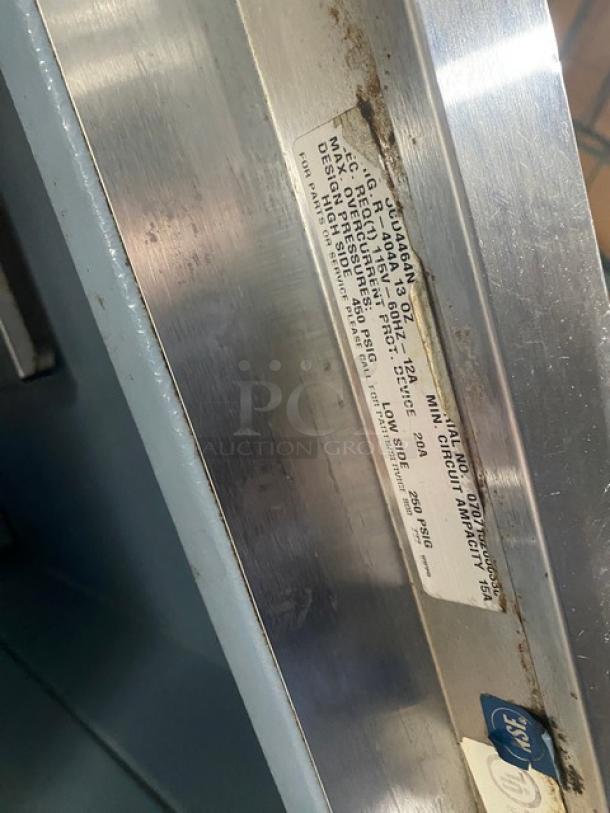 Delfield stainless steel 4-drawer refrigerated prep table, Model UCD4464N-12-DD5, with overhead shelf; 115V 1 Phase.